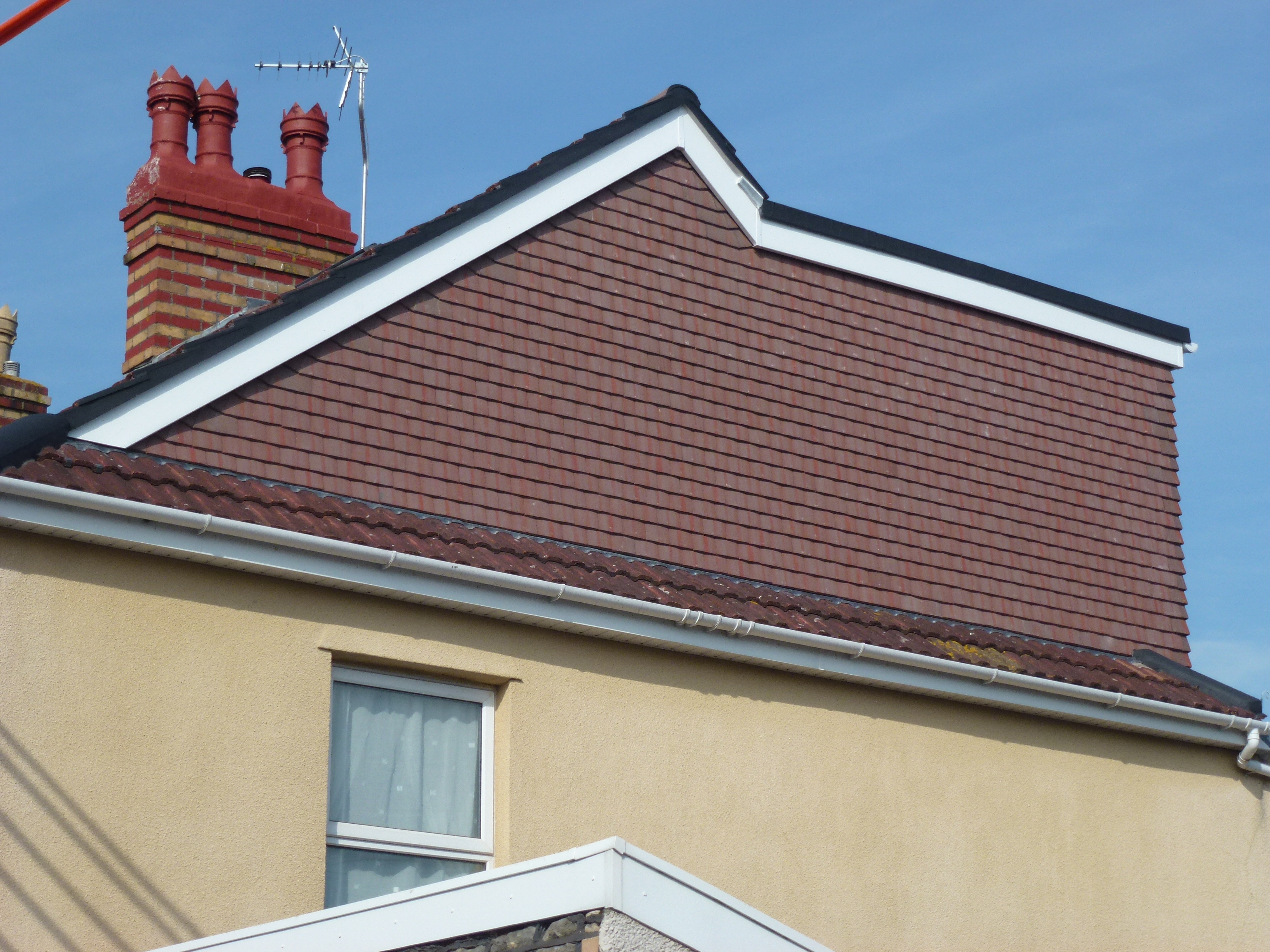 Rear flat roof dormer