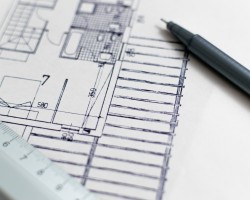 Architecture blueprint with pen and ruler