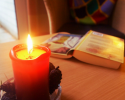 book, candle, half read book, reading